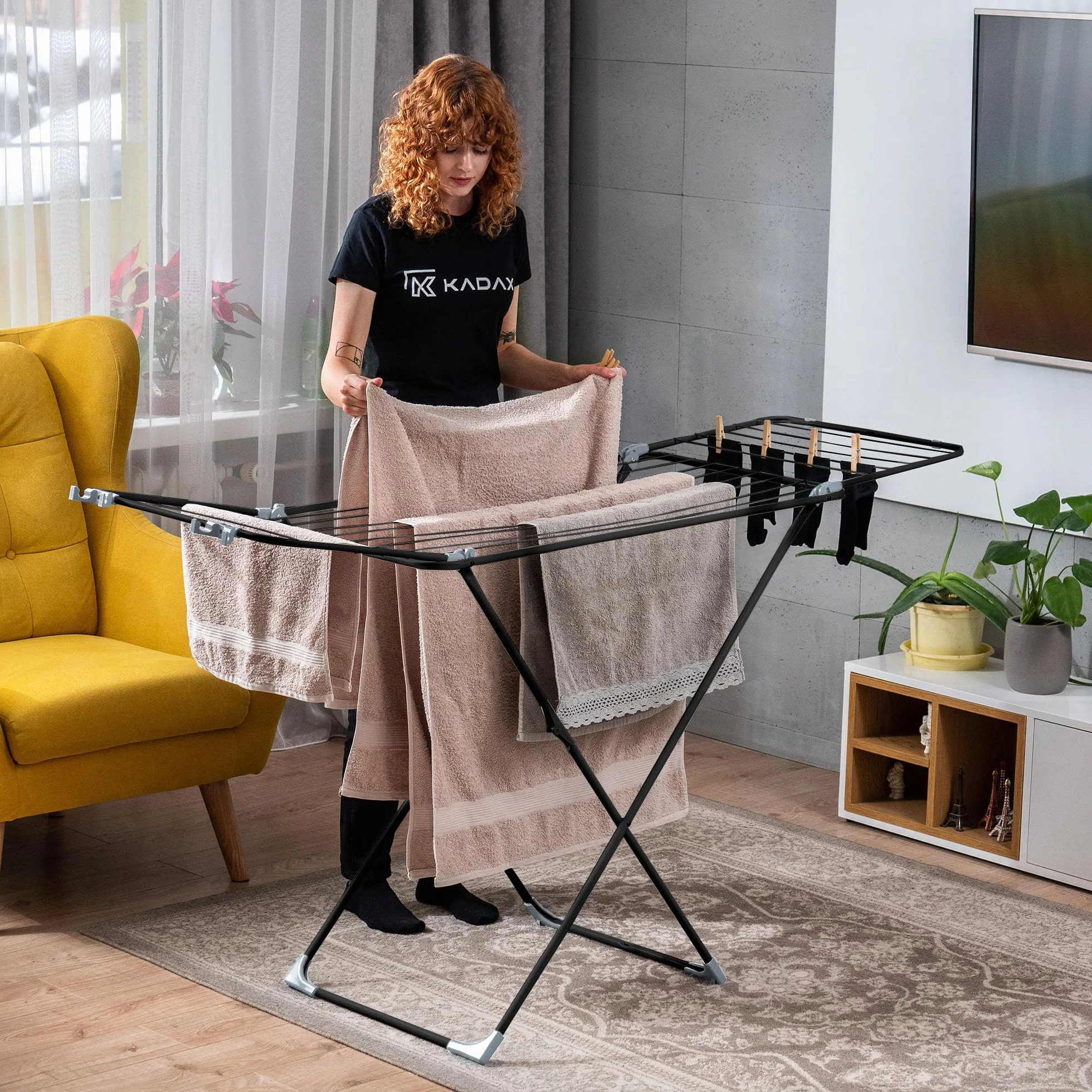 KADAX Stendibiancheria pieghevole 3in1, 18 m superficie di asciugatura, stendino con ruote, piedini antiscivolo, salvaspazio, per termosifone & vasca, interno & esterno – Nero