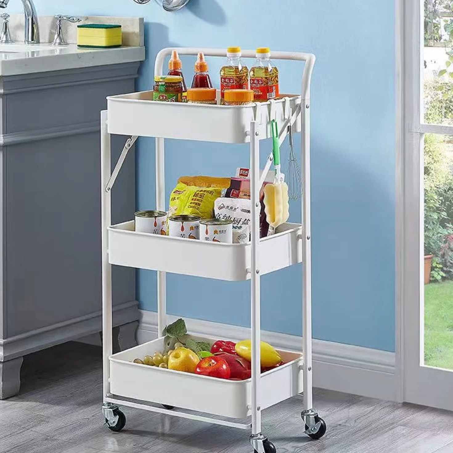 Megashopitalia Carrello Cucina Pieghevole Multiuso con Manico 3 Ripiani Cestelli 4 Ruote girevoli e Freno Integrato in Metallo Trolley Salvaspazio da Servizio Bianco