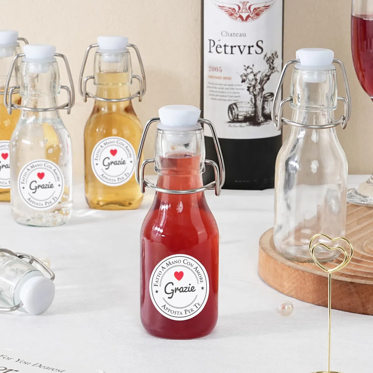 Winter Shore Bottiglie Vetro Piccole 120 ml con Tappo ed Etichette (Set da 20) - Bottigliette Vetro Bomboniere Riutilizzabili - Mini Alcolici Bottiglie - Bottigliette Alcolici con Tappo a Ribalta